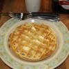 Plated waffle with butter waiting to be served